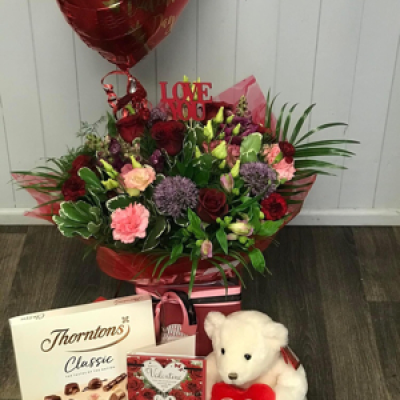 A Grand Gesture - Why not truly spoil that special someone with an opulent gift package of a luxury aqua hand tied bouquet, Teddy, Deluxe Chocolates, Balloon & a Valentine’s Card. They will feel extra special this year. 