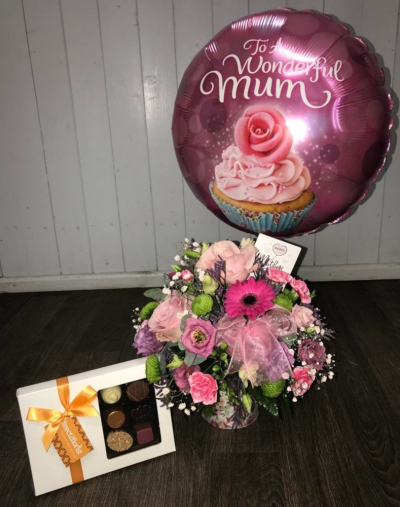 Sweet Treat - A pretty posy arrangement, box of luxury Belgian chocolates & a balloon, a treat for the senses.

*PLEASE NOTE flowers & balloon may vary due to availability.