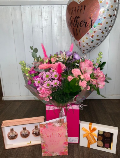 With All My Love - Spoil that special person with a gift that just keeps giving.

A fabulous seasonal aqua hand tied bouquet, box of luxury Belgian chocolates, diffuser set, balloon & card!!

They will be blown away by this spectacular package.

*Please note flowers, diffuser scent, balloon & card design may vary to to availability*