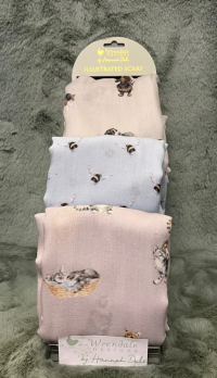 Wrendale Scarf - This gorgeous lightweight scarf will add a touch of colour to any outfit. Three gorgeous illustrated designs: dogs, bees or cats.

*PLEASE SPECIFY PREFERED DESIGN IN ORDER DESCRIPTION*

*ITEM IS ONLY AVAILABLE AS AN ADD ON GIFT OR FOR COLLECTION*

*LIMITED AVAILABILITY*

Measures 93cm x 194cm and is made from 100% recycled polyester. Hand wash only.